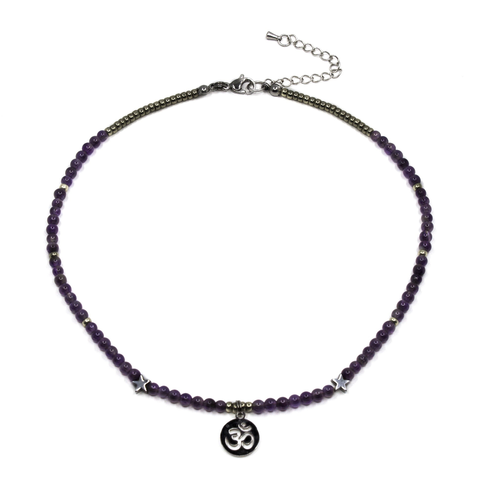 amethyst beaded necklace with an om charm and star beads on a white background