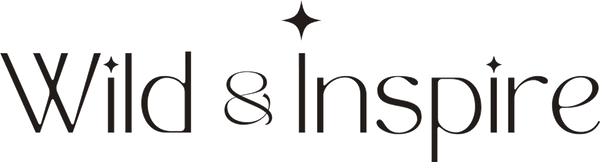Black serif text reading 'Wild & Inspire' with small star-like accents above the letters, shown on a white background.