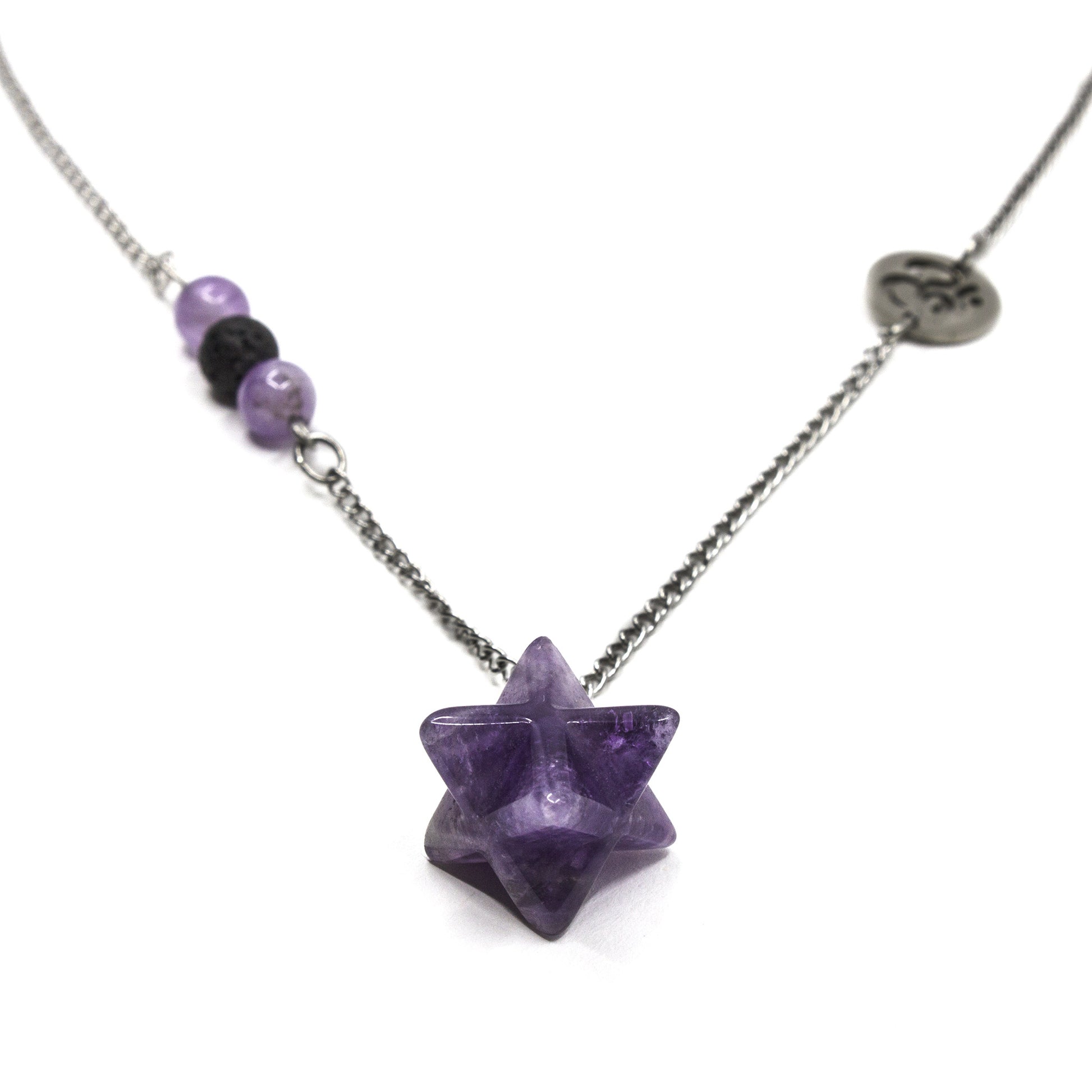 Necklace with a purple gemstone pendant on a white background